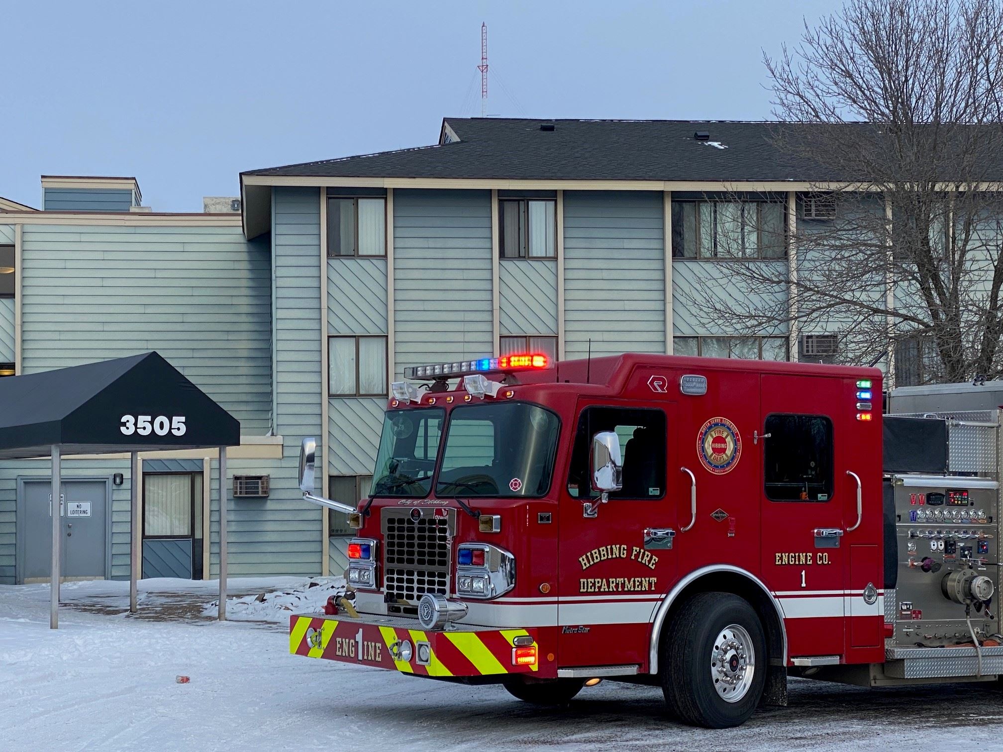 Fire engine parked in front of a building
